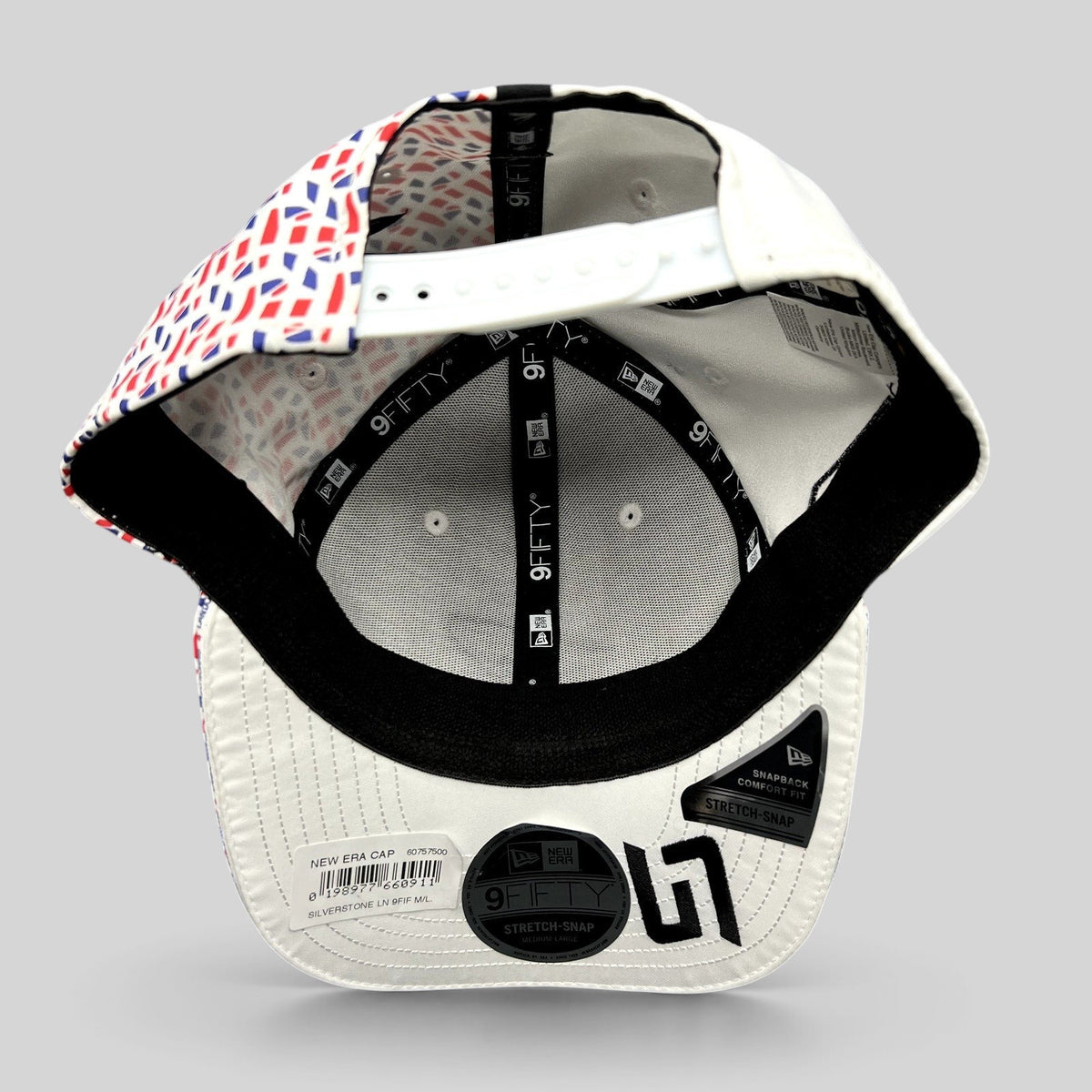Raree Finds McLaren Formula 1 Team New Era 9FIFTY cap interior showing geometric print and stretch-snap closure
