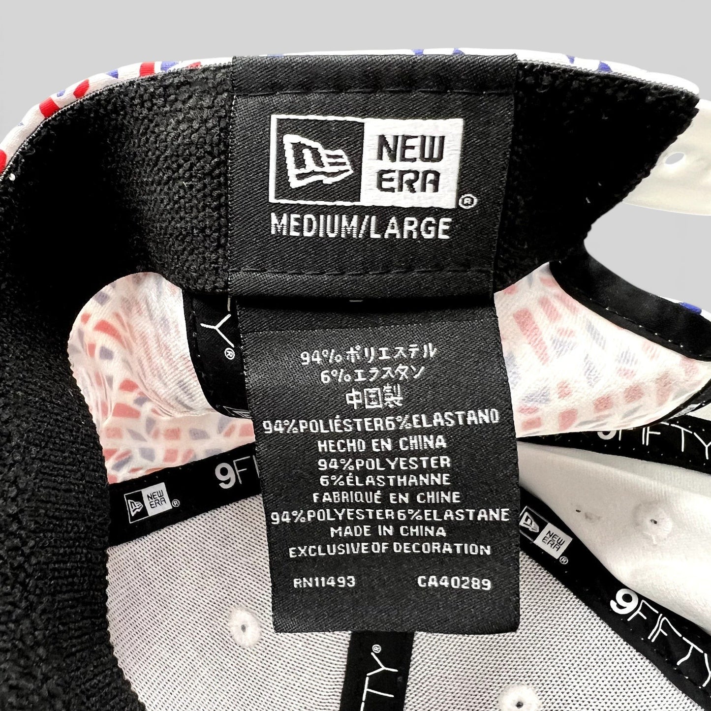 Raree Finds McLaren Formula 1 Team New Era 9FIFTY cap interior label showing material composition and sizing