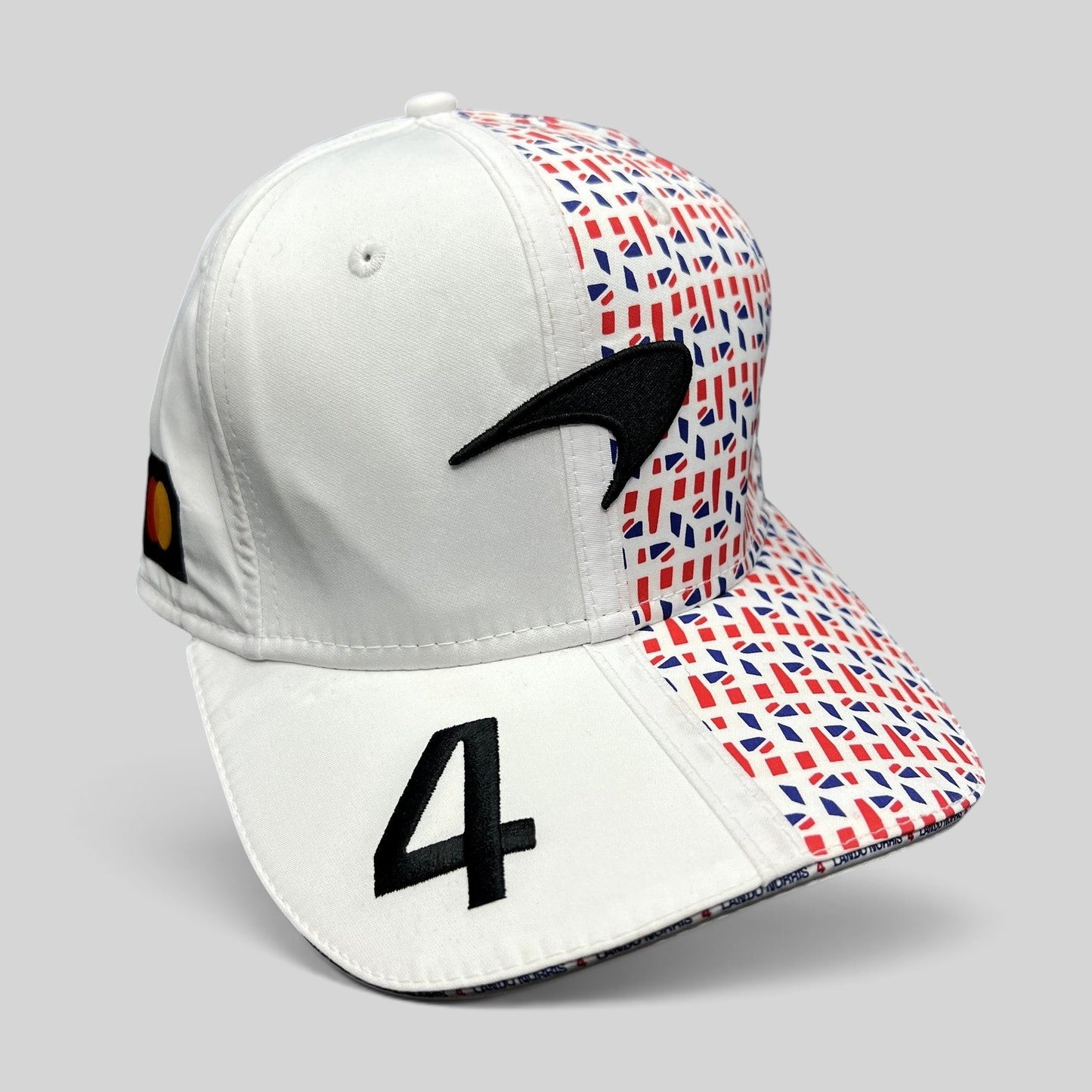 Raree Finds McLaren Formula 1 Team 9FIFTY snapback hat in white with red and blue geometric print and number 4 detail