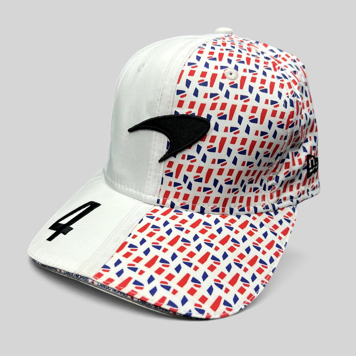 Raree Finds McLaren Formula 1 Team 9FIFTY stretch snapback hat with geometric red, blue, and white racing print.