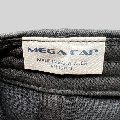 Raree Finds Mega Cap brand label inside a black cotton hat with manufacturing details from Bangladesh