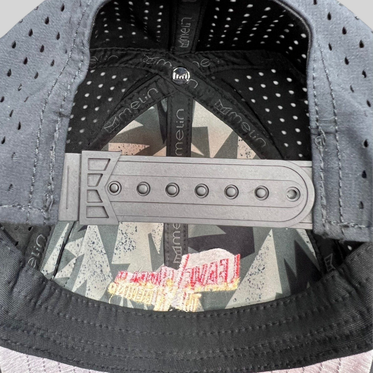 Raree Finds Melin Leave the World Behind crew hat showing the interior snapback closure and branded lining