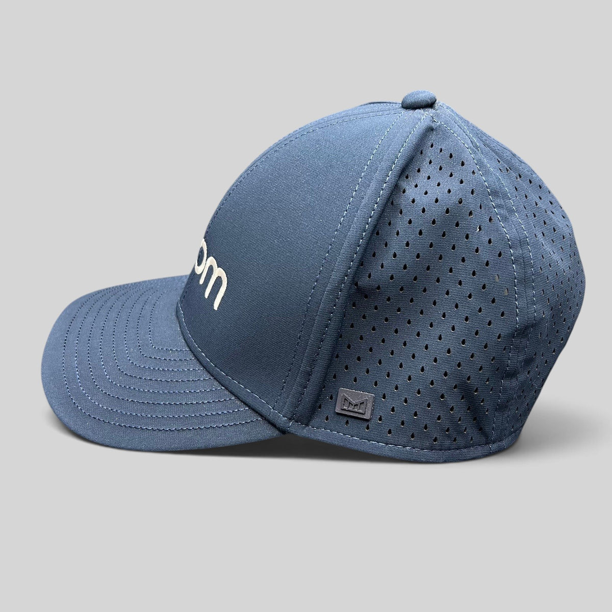 Raree Finds navy Melin Hydro A-Game snapback hat with Zoom embroidery and laser-perforated side panels