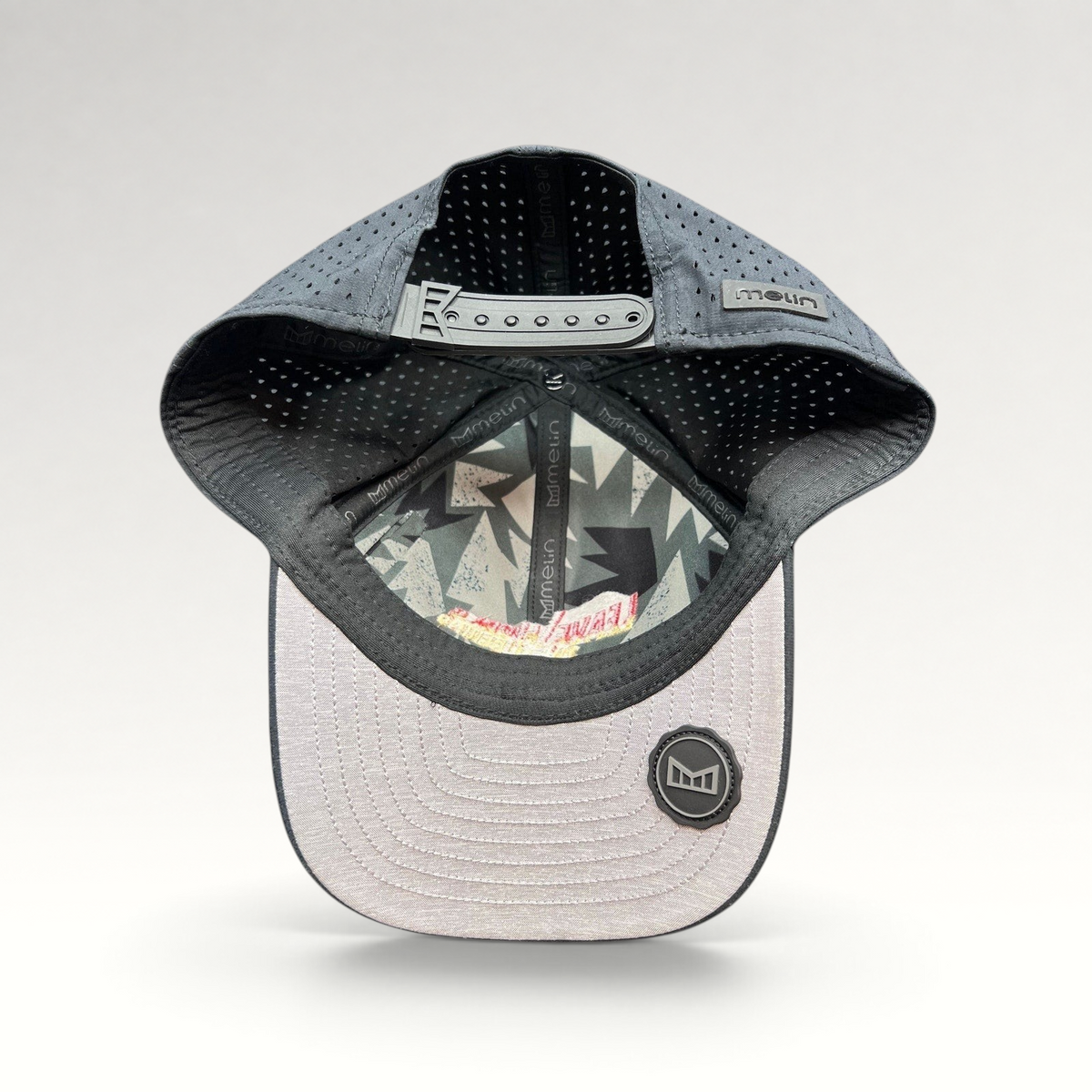 Raree Finds Melin Leave the World Behind snapback hat featuring a grey perforated crown and light grey brim