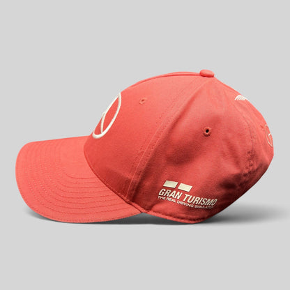 Raree Finds coral pink Mercedes AMG Petronas strapback hat with white Gran Turismo embroidery on the side profile