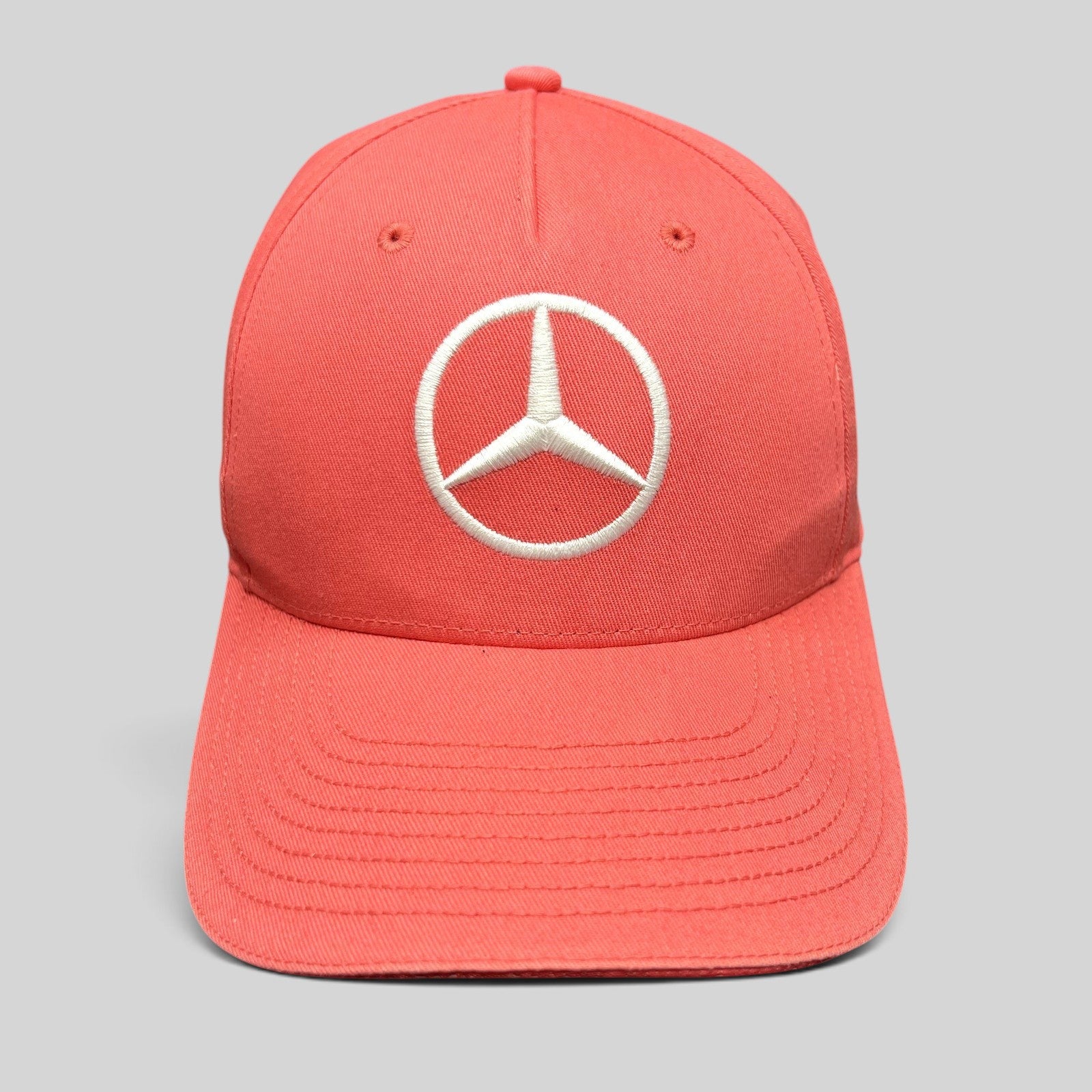 Raree Finds coral pink Mercedes AMG Petronas strapback hat with a large white embroidered three-point star logo
