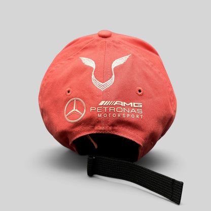 Raree Finds Mercedes AMG Petronas strapback hat in coral pink with white embroidered logos on the back