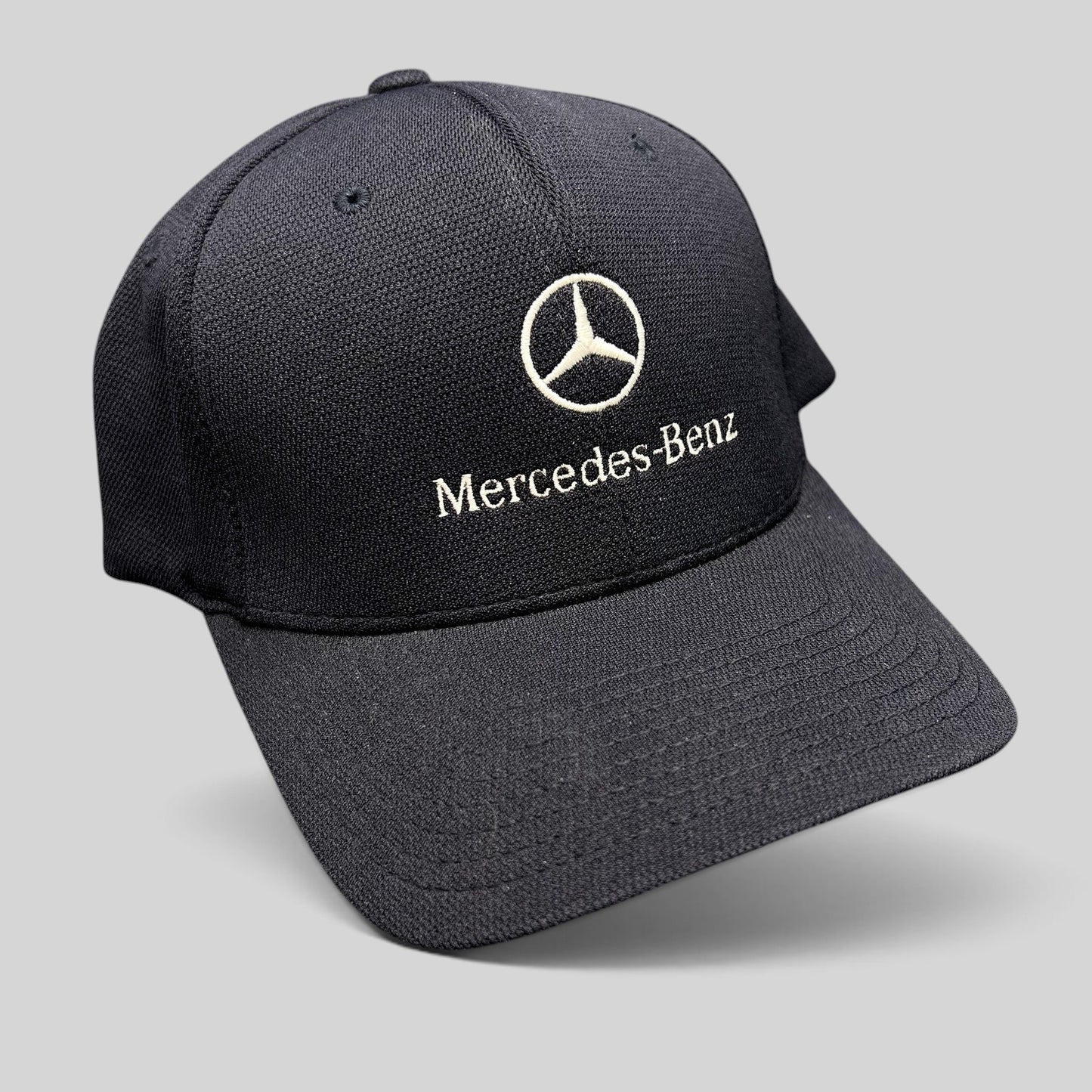 Raree Finds navy blue Mercedes-Benz Flexfit cap with white embroidered logo and script on a structured crown