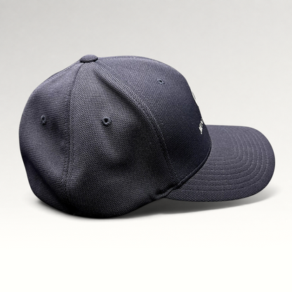 Raree Finds navy blue Mercedes-Benz Flexfit hat with embroidered logo and structured crown, side profile view.