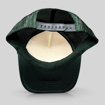 Raree Finds Mesa Cafe Santa Barbara trucker hat showing the interior foam lining, dark green mesh, and snapback strap.
