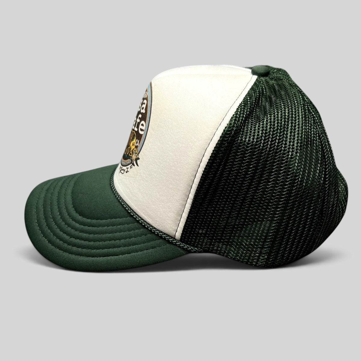 Raree Finds Mesa Cafe Santa Barbara trucker snapback hat with white foam front, dark green brim, and mesh back.