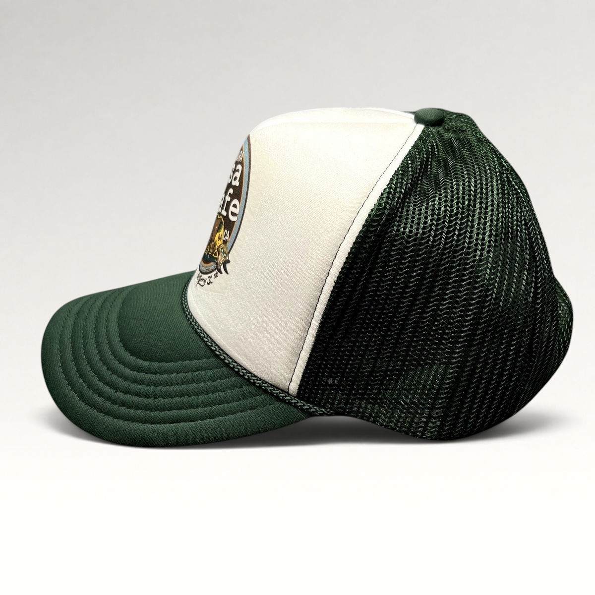 Raree Finds Mesa Cafe Santa Barbara trucker snapback hat with white foam front, dark green brim, and mesh back.