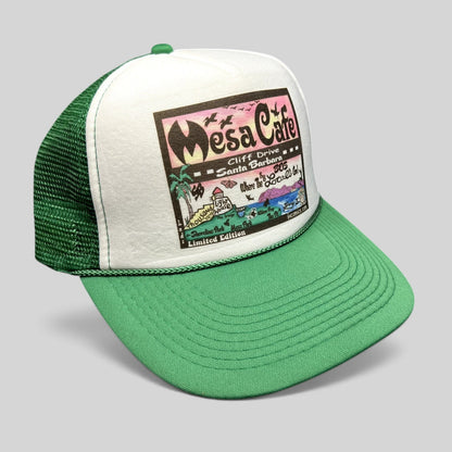 Raree Finds Mesa Cafe Santa Barbara trucker hat with green brim, white foam front, and colorful coastal graphic logo.