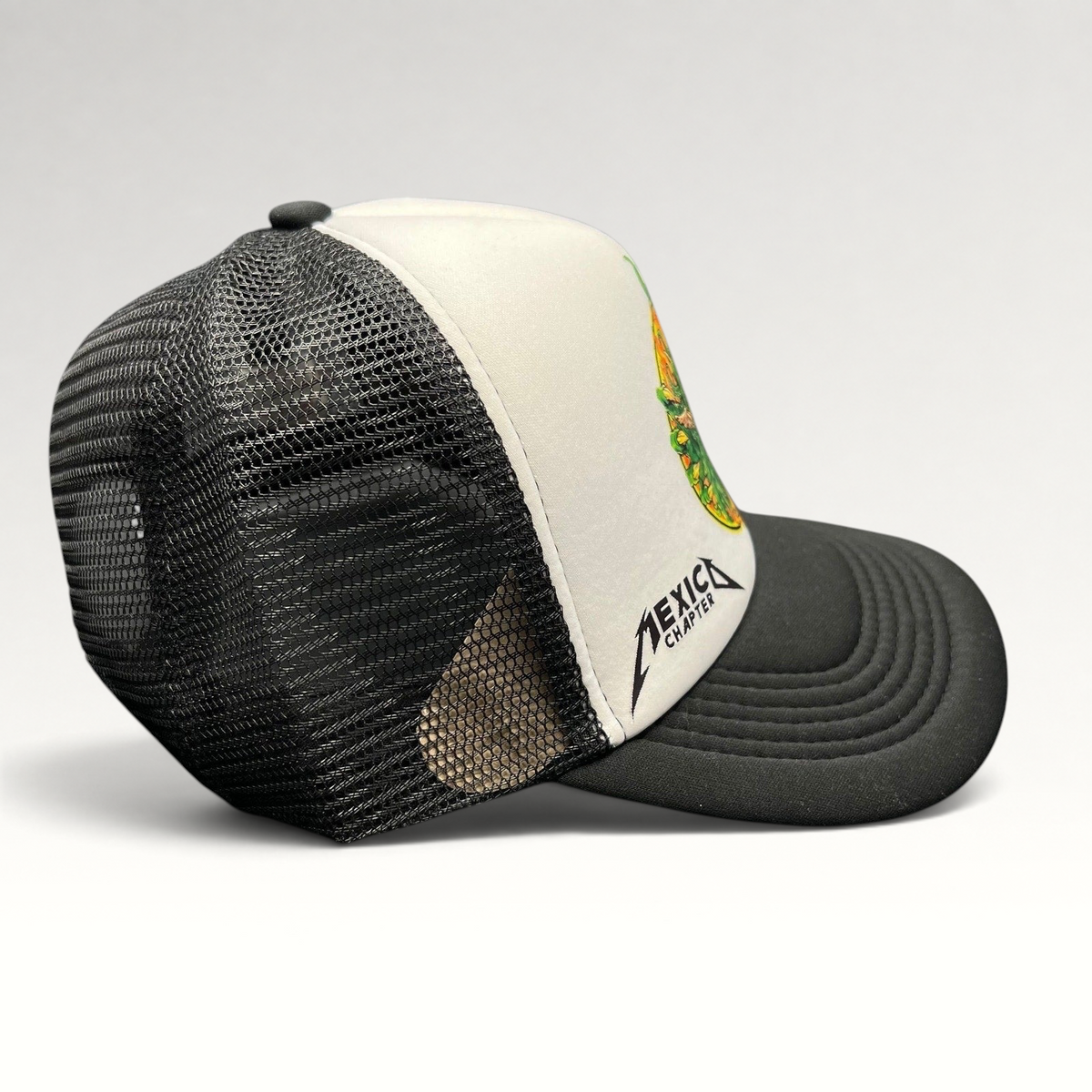 Raree Finds vintage Metallica Mexican Militia Chapter trucker hat with white foam front, black mesh, and side logo.