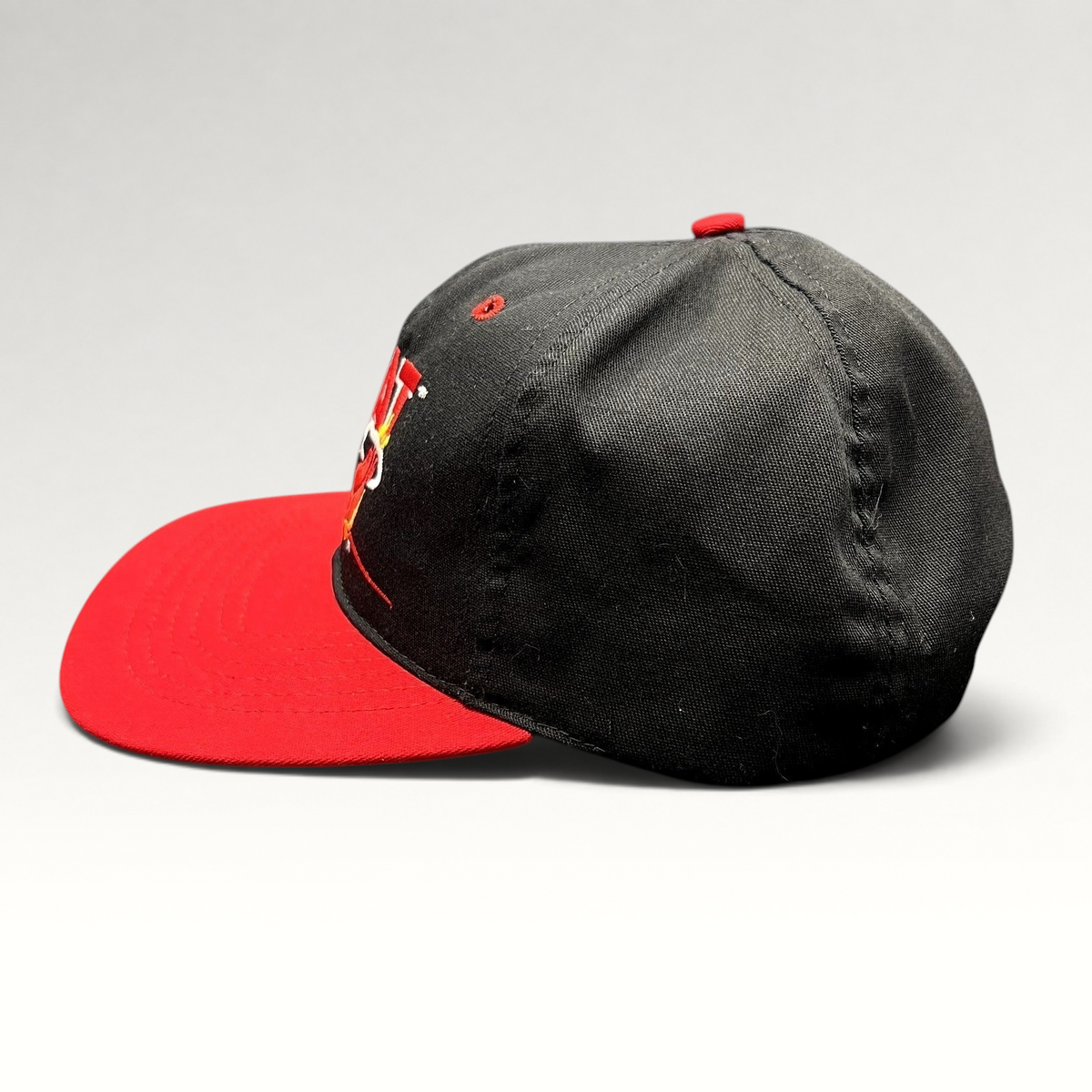Raree Finds vintage 1990s Miami Heat snapback hat with black crown, red brim, and embroidered team logo.