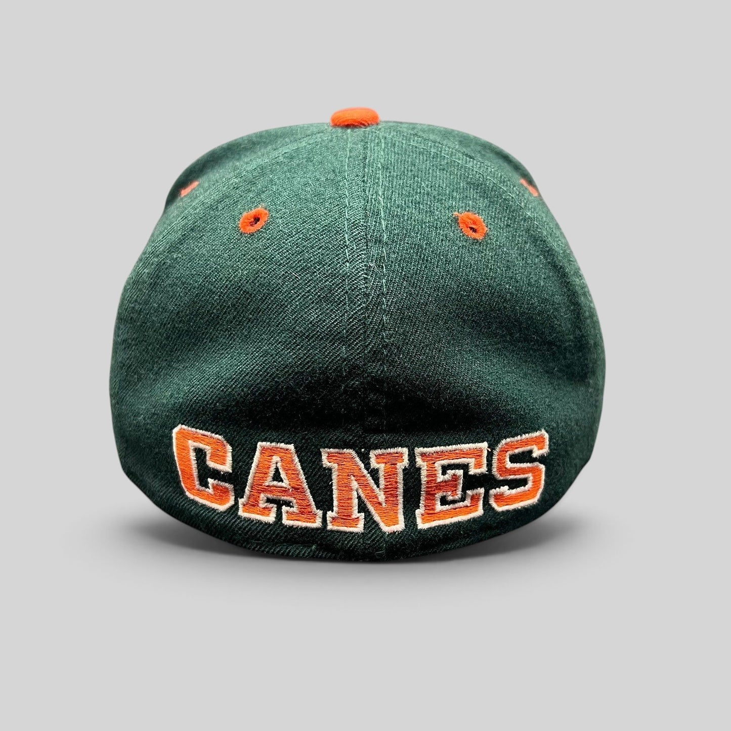 Raree Finds vintage Miami Hurricanes fitted hat showing the back with orange CANES embroidery on a dark green wool cap