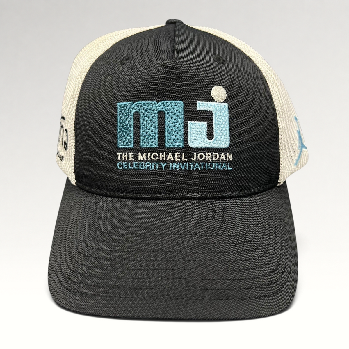 Raree Finds black and white Michael Jordan Celebrity Invitational mesh back Flexfit golf hat with embroidered logo