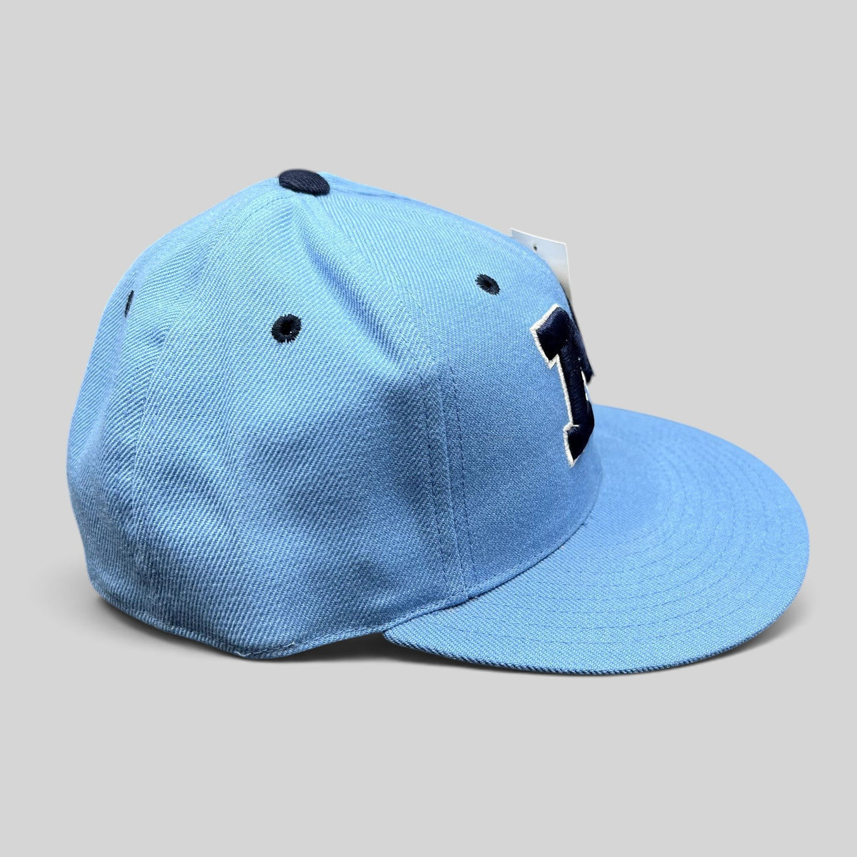 Raree Finds vintage light blue Michigan Wolverines fitted hat with navy embroidered logo and structured crown