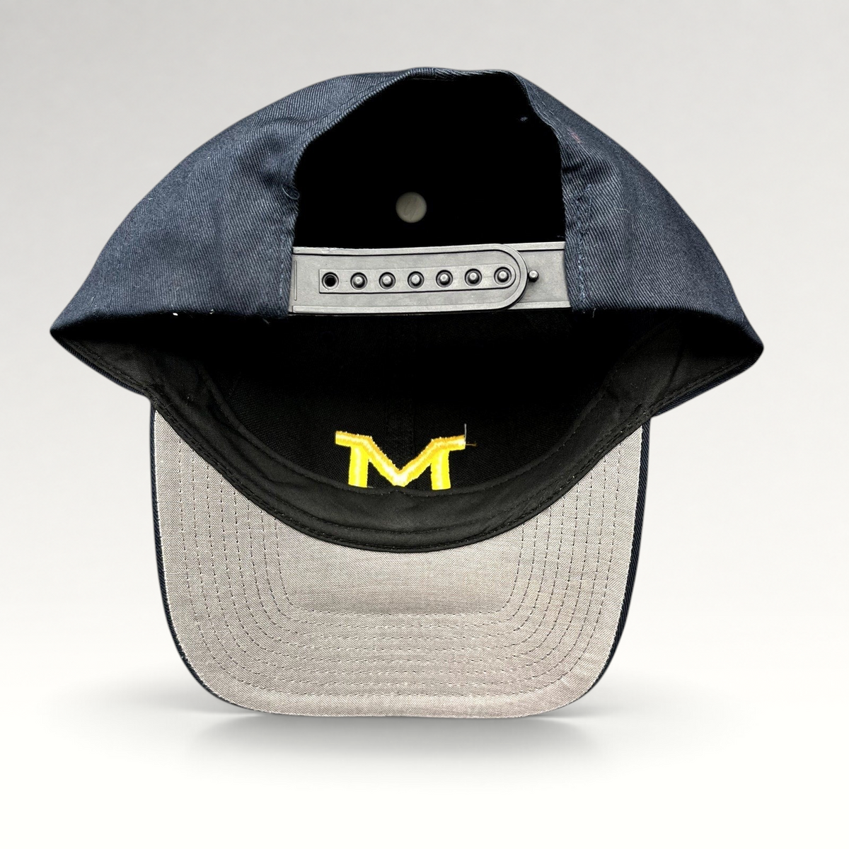 Raree Finds vintage Michigan Wolverines navy snapback hat with maize Block M embroidery and gray undervisor