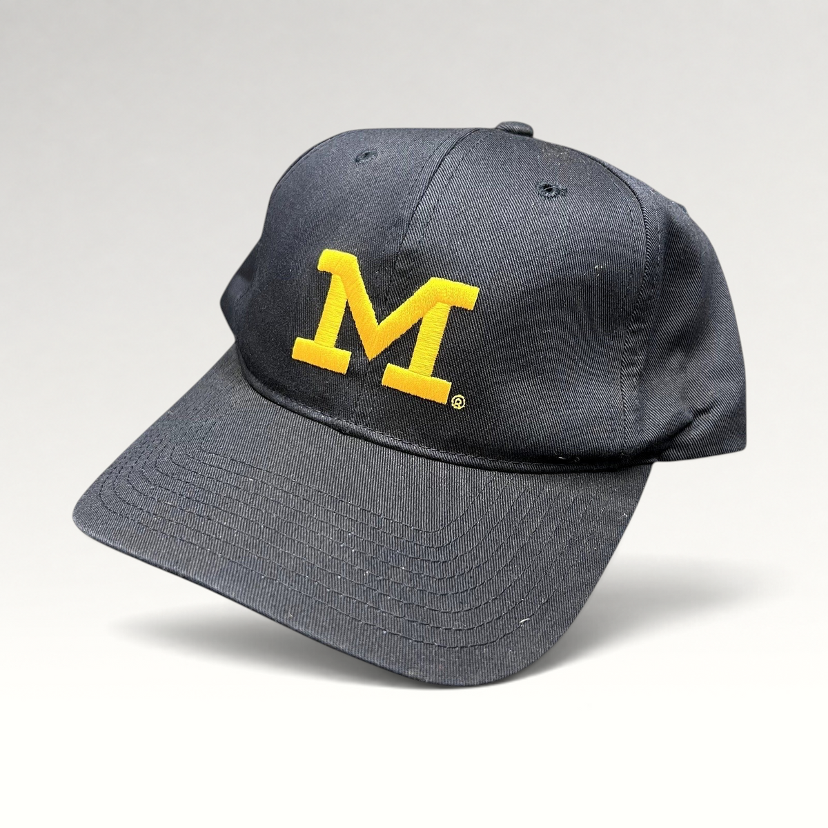 Raree Finds vintage navy blue Michigan Wolverines snapback hat with maize yellow Block M embroidery