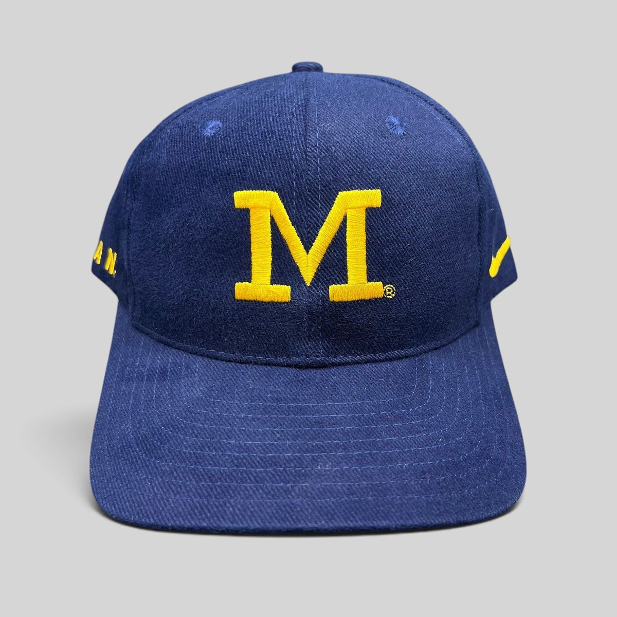 Raree Finds vintage navy blue and maize Michigan Wolverines snapback hat with embroidered block M logo