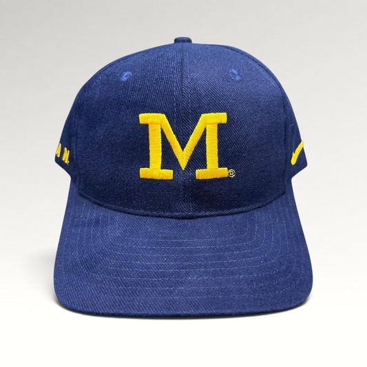 Raree Finds vintage navy blue and maize Michigan Wolverines snapback hat with embroidered block M logo