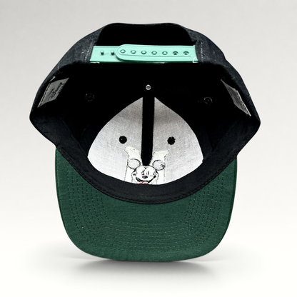 Raree Finds vintage 90s Disney Store Mickey Mouse snapback hat showing the green adjustable closure and inner lining