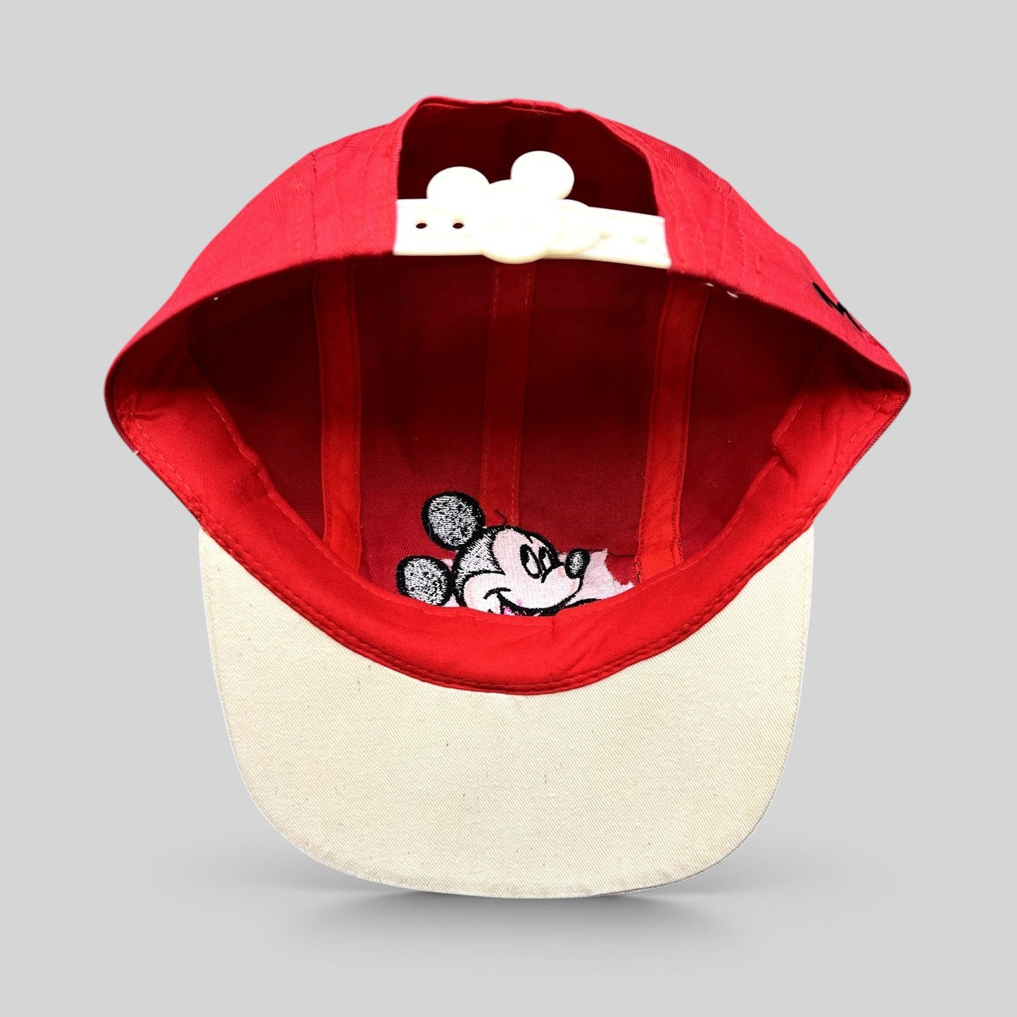 Raree Finds Disney Mickey Mouse youth snapback hat in red and white with an adjustable Mickey-head snap closure.