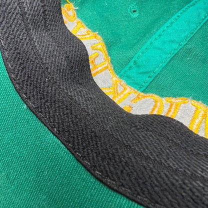 Raree Finds vintage 90s Mickey’s Malt Liquor cap interior showing green cotton fabric and black sweatband detail