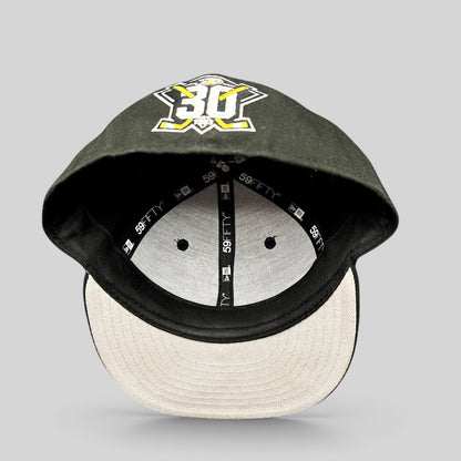 Raree Finds black New Era 59FIFTY Mighty Ducks 30th Anniversary fitted hat showing interior branding and sweatband