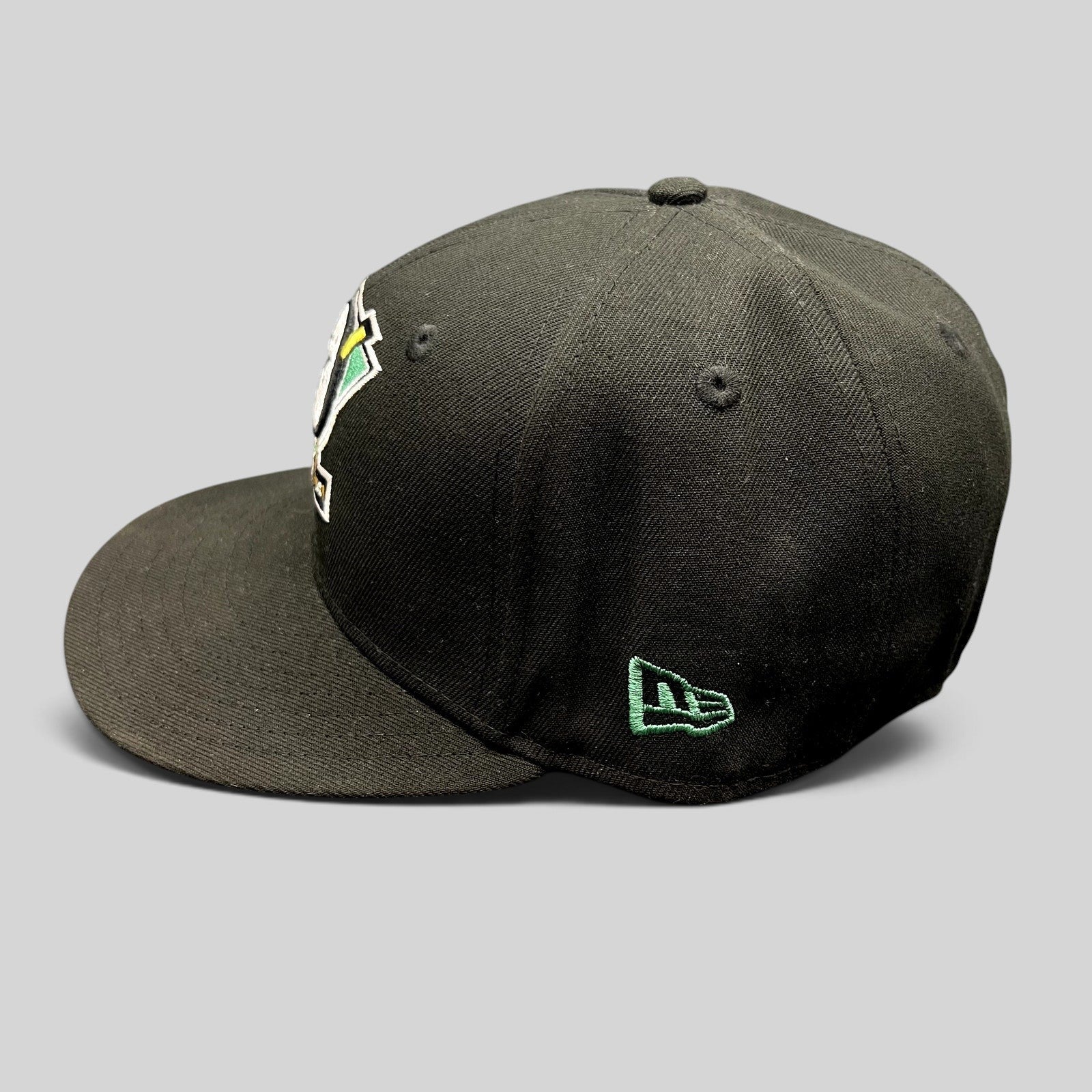 Raree Finds black New Era 59FIFTY Mighty Ducks 30th Anniversary fitted hat with embroidered goalie mask logo
