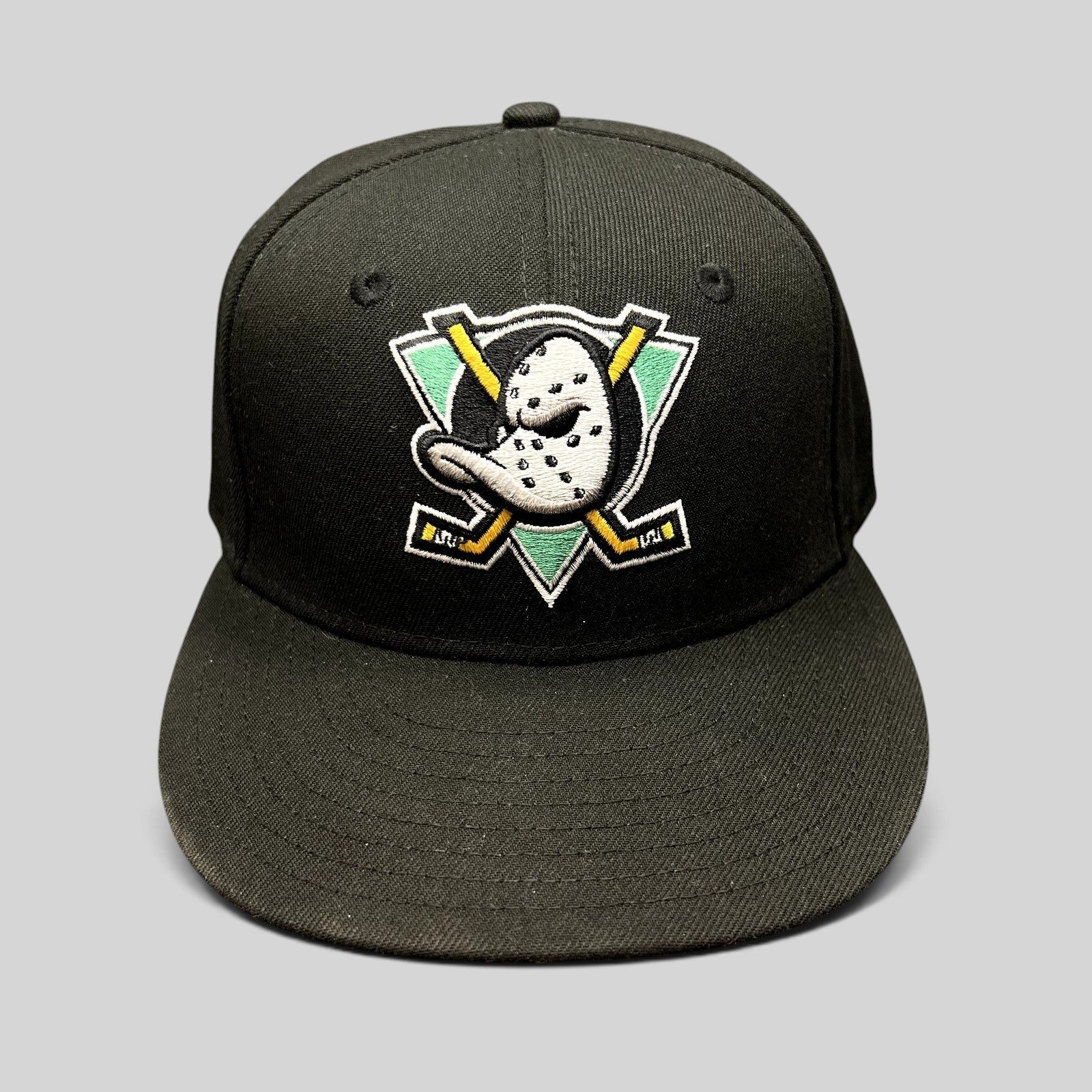 Raree Finds black New Era 59FIFTY fitted hat featuring the embroidered Anaheim Mighty Ducks goalie mask logo