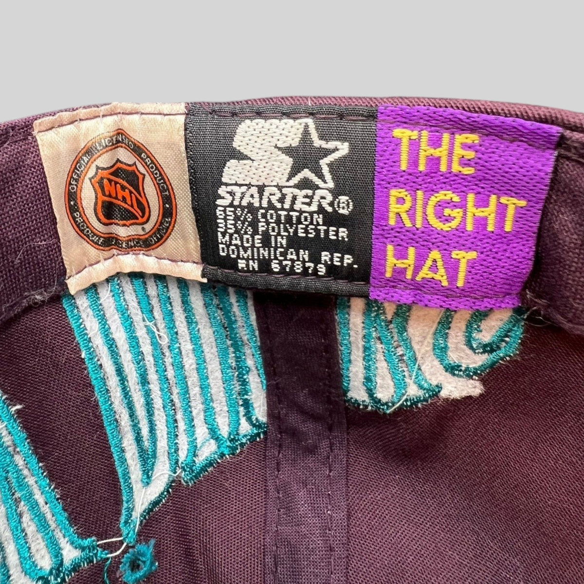 Raree Finds vintage 90s Starter Mighty Ducks snapback interior tag with NHL logo and The Right Hat branding