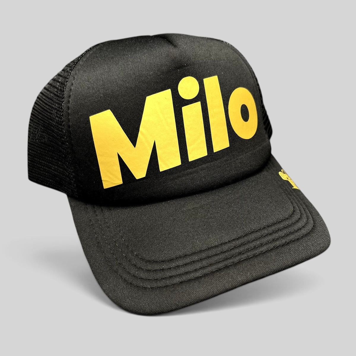 Raree Finds black foam trucker hat with yellow Milo logo and side cactus embroidery, featuring a mesh back.
