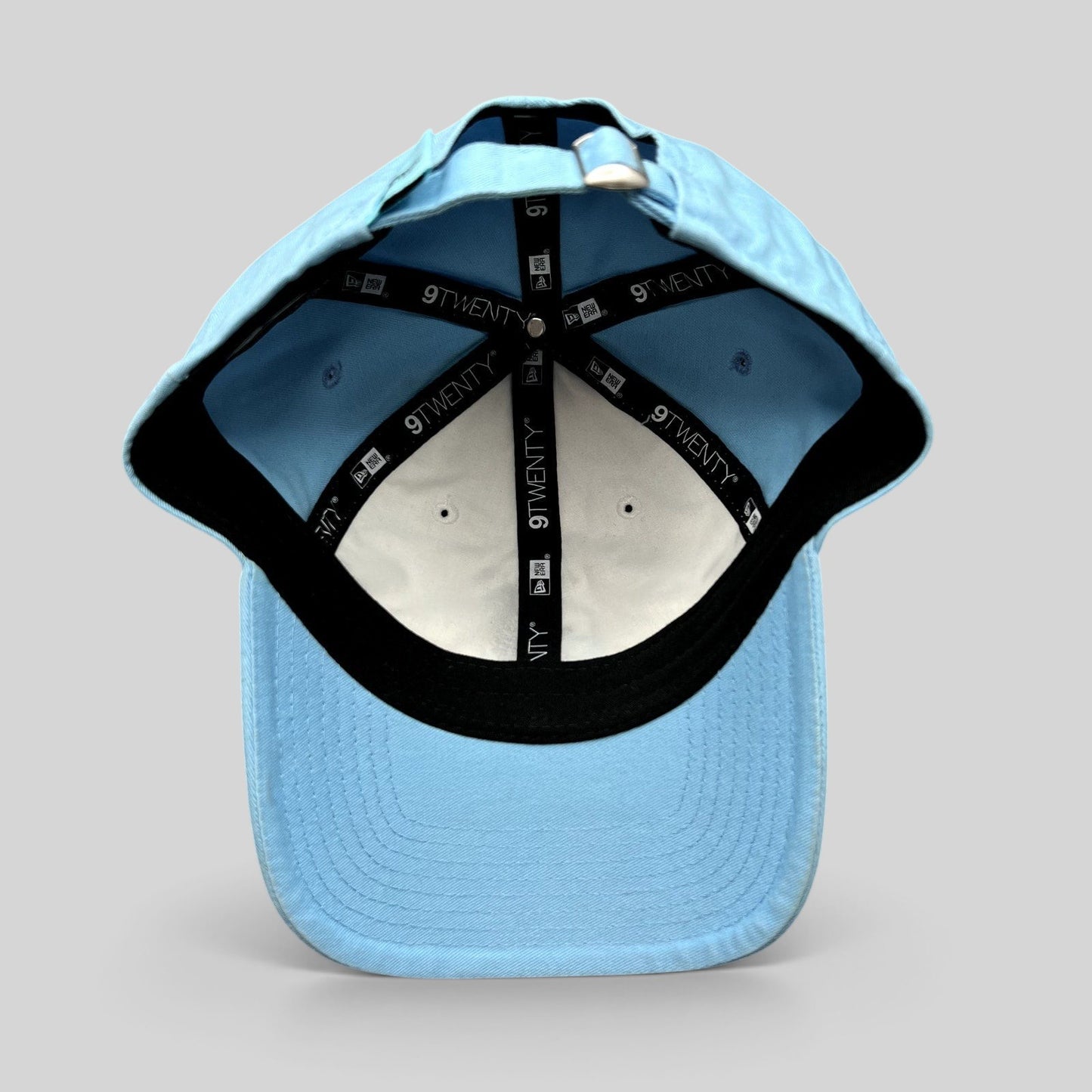 Raree Finds Minnesota United FC New Era 9TWENTY hat interior showing white panels, black branding tape, and light blue