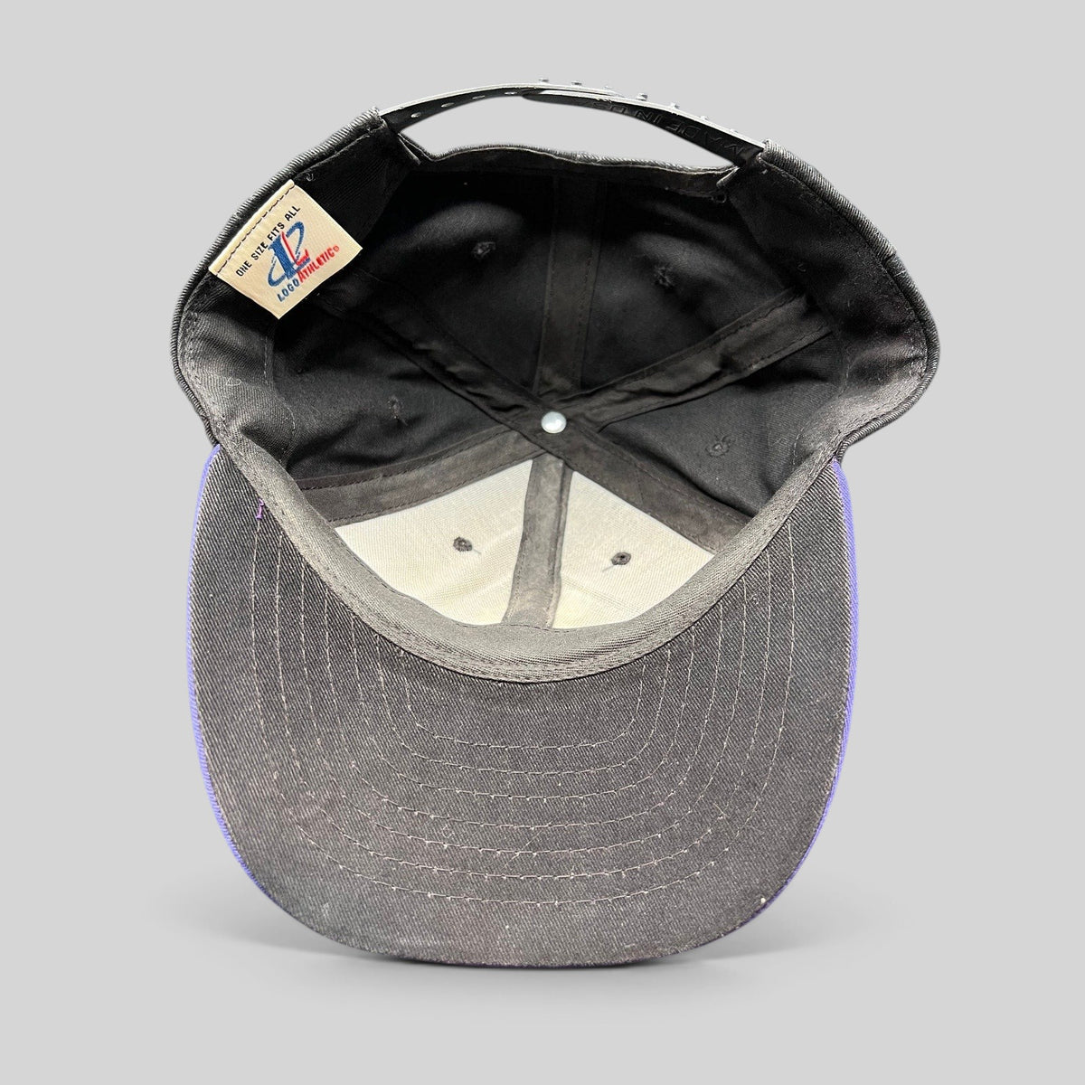 Raree Finds vintage Minnesota Vikings Logo Athletic snapback interior showing brand tag and black underbrim