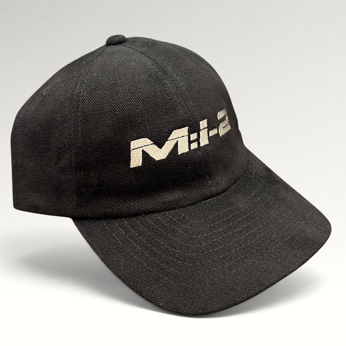 Raree Finds vintage black corduroy Mission Impossible 2 promotional snapback hat with embroidered M:I-2 logo