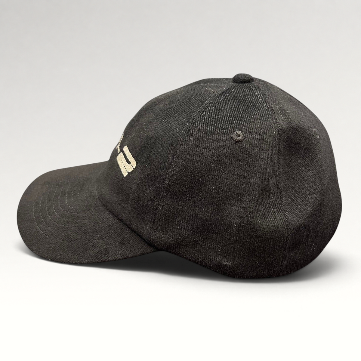 Raree Finds vintage black corduroy snapback hat with embroidered M:I-2 logo from the 2000 Mission Impossible 2 film.