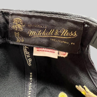 Raree Finds Mitchell & Ness x OVO Toronto Raptors snapback interior label with gold embroidery on black fabric