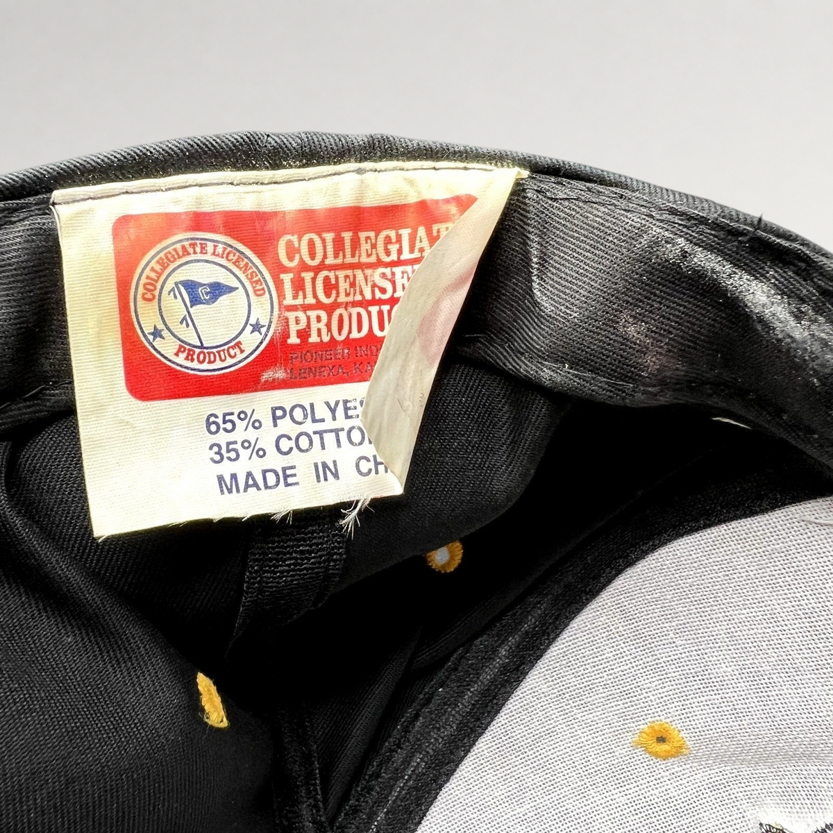 Raree Finds vintage University of Missouri Mizzou snapback hat interior tag showing collegiate licensing details