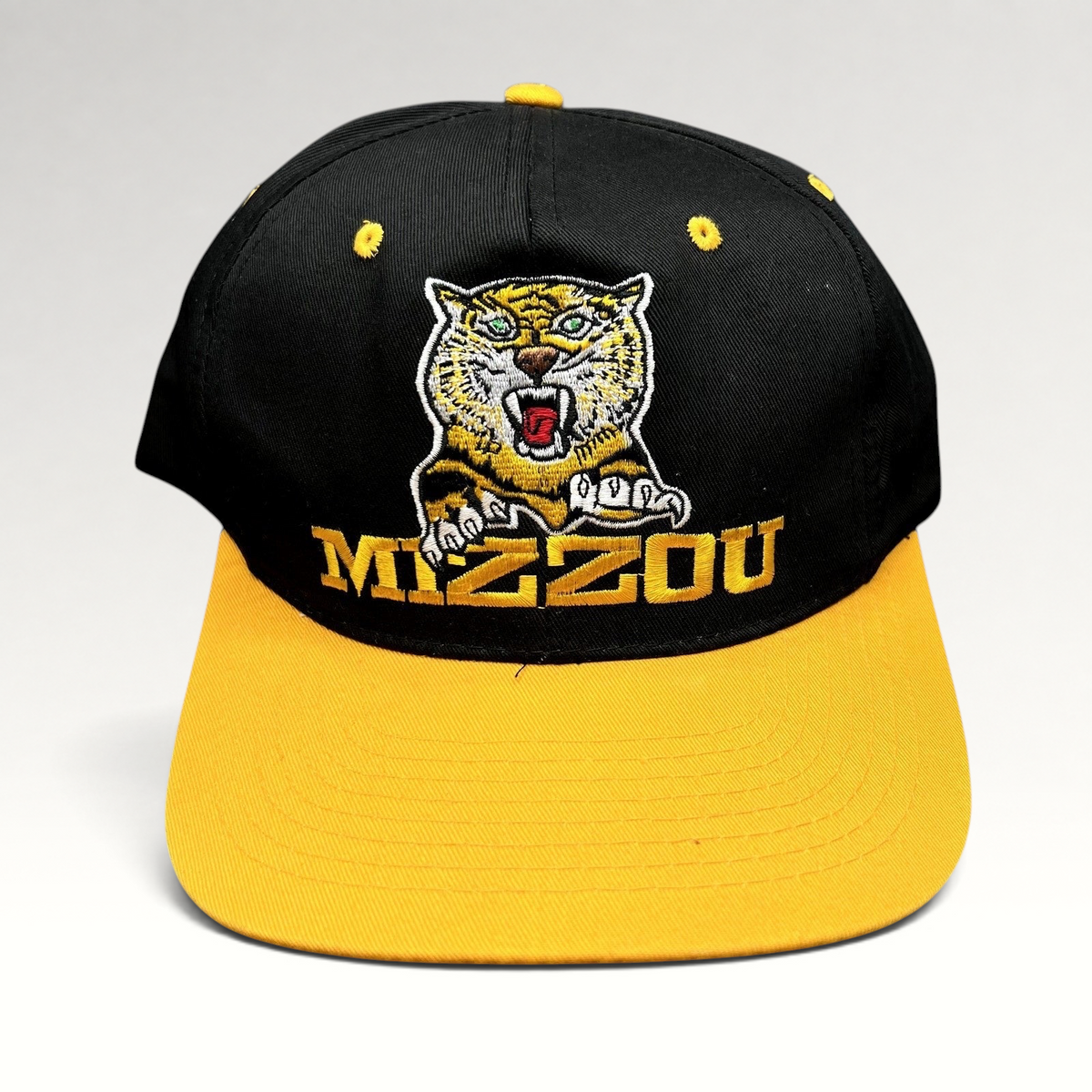 Raree Finds vintage University of Missouri Mizzou snapback hat in black and gold with embroidered tiger mascot logo