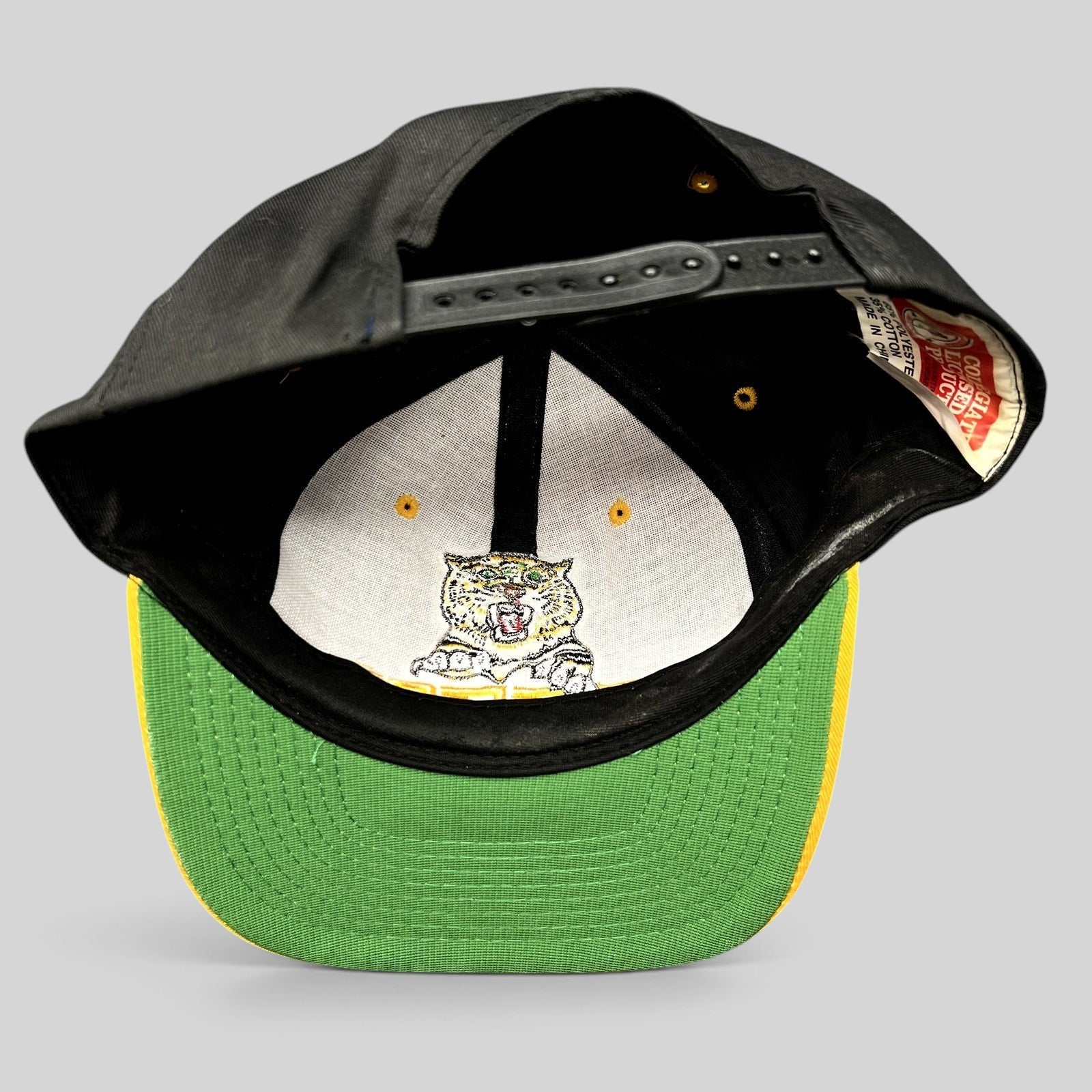 Raree Finds vintage University of Missouri Mizzou snapback hat showing the green undervisor and interior tiger graphic