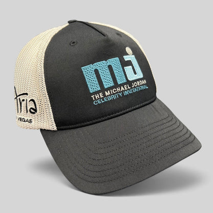 Raree Finds black and white MJ Celebrity Invitational mesh back Flexfit golf hat with embroidered front logo.