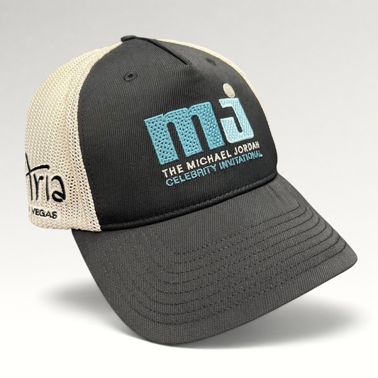 Raree Finds black and white MJ Celebrity Invitational mesh back Flexfit golf hat with embroidered front logo.