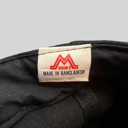 Raree Finds Mohrs brand tag inside a black cotton snapback hat with red logo detail