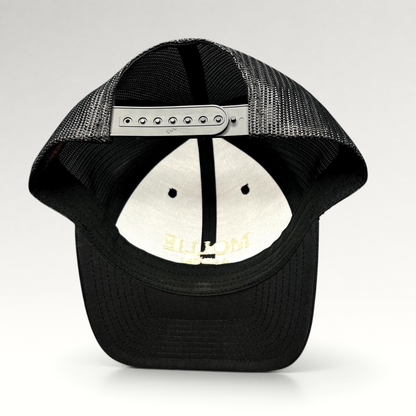 Raree Finds MOLLIE Aspen black trucker hat showing the adjustable snapback closure and breathable mesh back panels