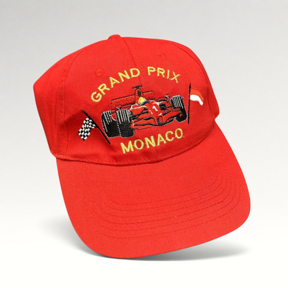 Raree Finds vintage red Monaco Grand Prix strapback hat with embroidered Formula 1 race car and checkered flags.