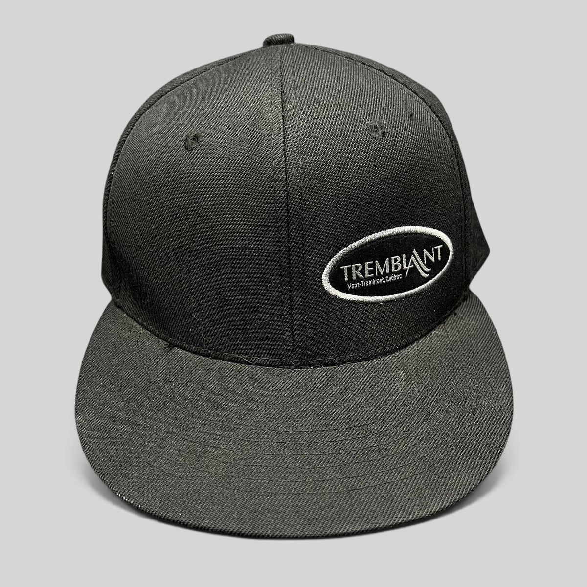 Raree Finds black Mont Tremblant snapback hat with white embroidered oval logo and flat brim ski resort design.