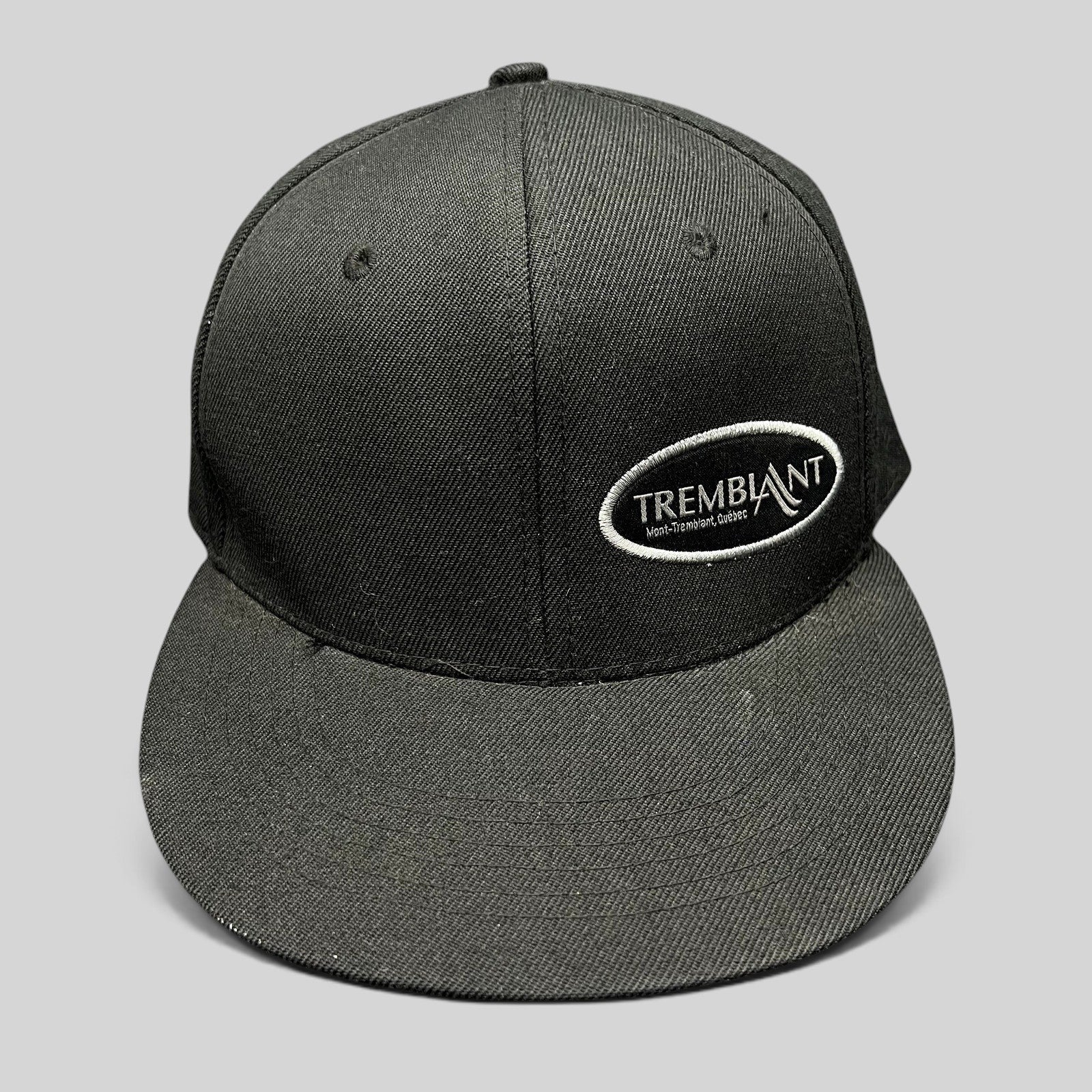 Raree Finds black Mont Tremblant snapback hat with white embroidered oval logo and flat brim ski resort design.