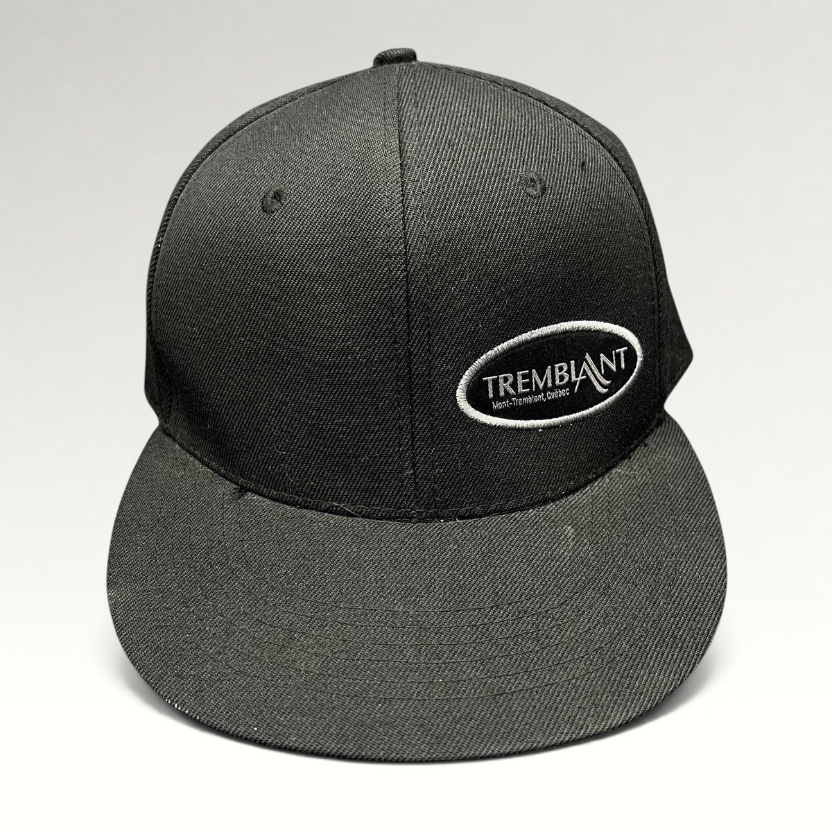 Raree Finds black Mont Tremblant snapback hat with white embroidered oval logo and flat brim ski resort design.